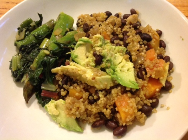 Black beans and quinoa with greens and avocado